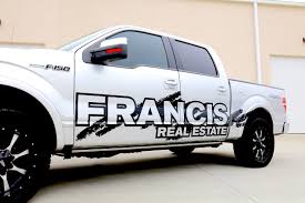 Wrap for a pickup truck utility cap. Vehicle Wrap Design And Installation In Northern Charlotte