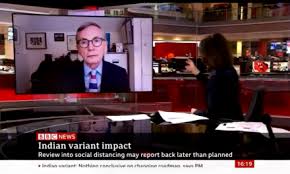 On the sign is the apparent cover of the upcoming game, featuring titans running. Vaccine Passports Dr Zubaida Haque On Bbc News Independent Sage