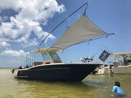 Scout Boats With Gemlux Shade On The Sandbar Perfect For Your Next Boat Party Boat Shade Boatshade Center Console Fishing Boats Sport Fishing Boats Boat