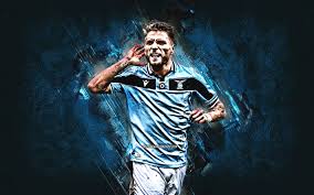 About ciro immobileciro immobile is an italian professional footballer who plays as a striker for serie a club lazio and the italy national team. Download Wallpapers Ciro Immobile Italian Footballer Ss Lazio Portrait Serie A Blue Stone Background Italy Football For Desktop Free Pictures For Desktop Free