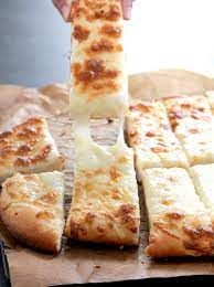 Pizza….it's the salvation of tired moms everywhere. Gluten Free Garlic Pizza Breadsticks Great Gluten Free Recipes