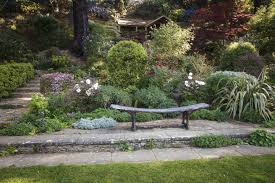 A 100 Year Old Garden Famous For Its Roses Cultivated By Three Generations Of Women Garden Stones Plants Little Gardens