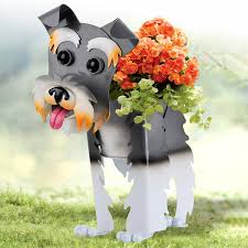 While some clouds look different for different people, the cloud in this photo is. Metal Dog Planters