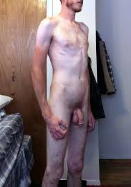 Country lads chopping wood in the nude