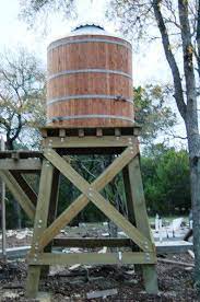 Wood Water Storage Tanks With Wood Or Steel Tower Water Storage Tanks Water Storage Water Barrel