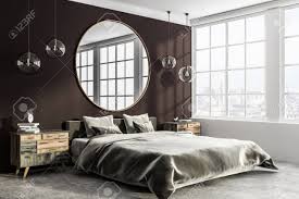 Available with double headboard, corner, suspended from the floor with high feet or with storage box. Corner Of Stylish Bedroom With Brown And White Walls Concrete Floor Gray Master Bed With Bedside Tables And Round Mirror Hanging Above It 3d Rendering Lizenzfreie Fotos Bilder Und Stock Fotografie Image