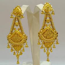 These 18 karat yellow gold earrings from turi are crafted in a door knocker design with a high polished ribbed finish and have. 24 Gold Earrings Designs Ideas Design Trends Premium Psd Vector Downloads