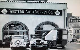 1930 S Vehicles And A Camper Parked At A Western Auto Store Auto Store Car Memorabilia Vintage Camping