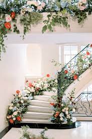 It features a large floral design made from iron in hues of teal and blue with gold highlights. 15 Pretty Perfect Floral Staircase Decor Perfete