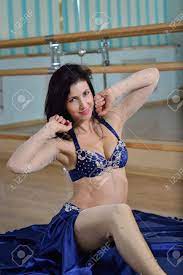 Young Beautiful Sexy Belly Dancer In Arabic Costume Dancing On A Floor.  Stock Photo, Picture And Royalty Free Image. Image 66122425.