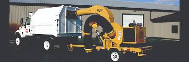 Onboard vacuum hose gets into tight spaces to make cleaning beds and gardens easier. Titan Leaf Pro Bonnell