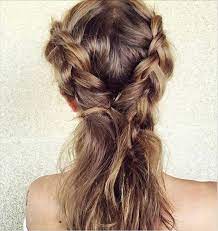 Use water or hairspray to hold it in place, and either knot a low bun at the nape of your neck or fashion a loose braid down your back. Hairstyles You Can Do With One Hair Tie Easy Hair Ideas Spring 2015