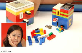 Then you need to make a piece like this that has a 2 by 2 hole in it so the outer border is 4 by 4 and put flats all around the sides except 2 middle ones. Teen Creates Lego Candy Machines