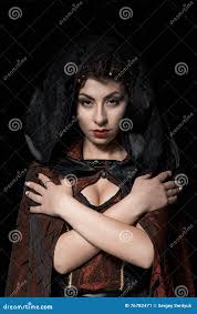 Portrait of a Girl Dark of the Queen with a Crown on Her Head and Make-up  Isolated on Dark Background, Boobs Beauty Face Stock Image - Image of  lipstick, halloween: 76782471