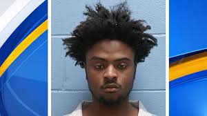 An Opelika man is accused of robbing Mike's Grocery and a Dollar General at  gunpoint, threatening clerks with what appeared to be a handgun hidden in a  bag. Investigators say Cortaveus Markeyon