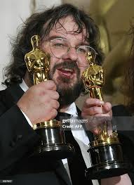 Director Peter Jackson poses with the Oscar for Best Director and the...  News Photo