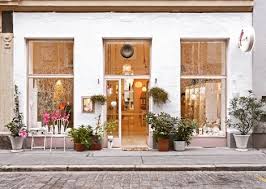 White Paint Storefront Exterior Potted Plants Large Windows Store Fronts Shop Window Cafe Plants