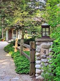 Now, this isn't a new idea for me, as i did exactly this at my last house and it looked awesome. Lake Michigan Cabin Makeover Driveway Landscaping Driveway Entrance Front Yard