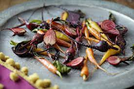 Roasted Baby Vegetables On Tray Stockphoto