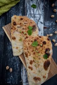 Homemade Peshwari Nan With Coconut And Pistachio Vegan Recipes Indian Food Recipes Peshwari Naan Recipe
