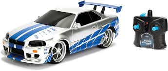 Jada Toys Fast Furious Rc Auto 2002 Nissan Skyline Gt R R34 Ferngesteuertes Auto Turbofunktion 2 Kanal Funkfernbedienung Usb Ladefunktion Inkl Batterien 1 16 Blau Silber Amazon De Spielzeug