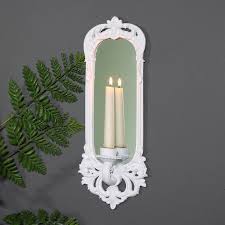 Unlimited decorative candles and votive candle holder styles & designs to fit your lighting requeriments and decor. Ornate White Wall Mirror Candle Sconce