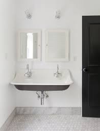Black And White Farmhouse Bathroom Tile Http Www Corcoran Com Nyc Modern Farmhouse Bathrooms Remodel Bathroom Design Tile Baseboard