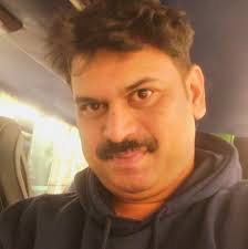 Thejas Mathew Karukayil added a...