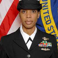 Hospital Corpsman 1st Class Vladimir Pierre-Charles, from Amityville, N.Y.,  and Hospital Corpsman 2nd Class Lauren Coons, from Philadelphia, document  Sailors shot records aboard the aircraft carrier USS Dwight D. Eisenhower  (CVN 69). -