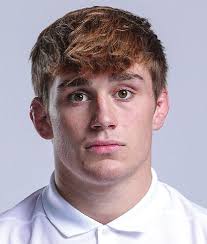 Wrestling_Northwestern and Michigan Notes.indd