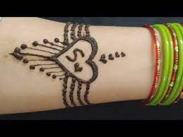 Isn't this a cute and simple heart . S Letter Tattoo With Heart Mehndi Design Special Someone Love Tattoos 2019 Y Simple Henna Tattoo Mehndi Designs For Hands Simple Mehndi Designs