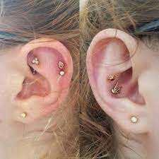 Outer Conch Double Helix And Rook Done By Kenny At Iris Piercing In Denver Outer Conch Piercing Piercing Ear Piercings