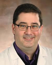 Dr. Vernon M May, MD