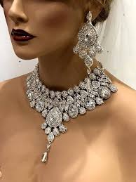 145) Emerald and diamond pendant-brooch, Black Starr & Frost, circa 1910