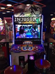 Raw Thrills Has Begun Testing An Arcade Version Of The Console Game Injustice Gods Among Us Where Players Can Buy Up To 49 Colle Arcade Injustice Arcade Games