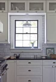 Black And White Cottage Kitchen With White Shaker Cabinets Accented With Brass Cup Pulls And White Cera White Cottage Kitchens Decatur House Kitchen Renovation