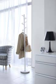 Designed by robert bronwasser for cascando, the tree coat stand is a free standing rack that can accommodate as many as twenty coats. Yamazaki Home Official Site Yamazaki Home Branch Coat Rack