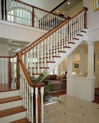 If you're working on new spindles, try painting them outdoors, then. Natural Wood Stair White Painted Risers And Spindles With Natural Stained Hand Rail Landing And Loft Rail Staircase Decor Staircase Pictures Staircase Design