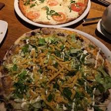 On the street of ventura boulevard and street number is 18800. California Pizza Kitchen At Tarzana 334 Photos 401 Reviews Pizza 18800 Ventura Blvd Tarzana Ca Restaurant Reviews Phone Number Menu