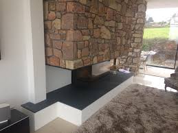 Although slate can cost more than limestone, it's still an affordable option. Welsh Slate Hearths Berwyn Slate