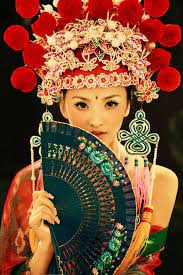 Chinese Bride With Hat And Fan Chinese Bride Traditional Chinese Wedding Chinese Opera