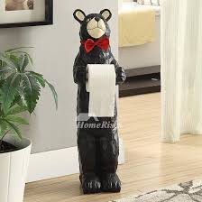 This page contains affiliate links. Funny Black Bear Toilet Paper Holder Standing Alone