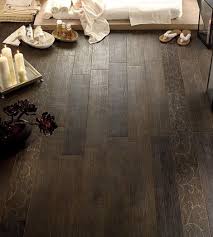 Basement Ceramic Tile That Looks Like Wood The Beauty Of Wood With The Ease Of Ceramic And No Grout Lines Ceramic Tiles Home Improvement Home Decor