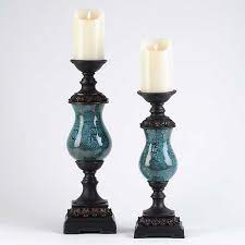 They are very elegant and they have unusual shape. Teal Antique Candle Holder Set Of 2 Kirklands