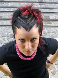 A technicolor touch makes it everything a punk is supposed to be. Short Punk Hairstyle With Black And Red Hair