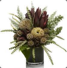 So if you're looking for masculine flowers to include in your wedding floral design, here are 13 ideas to get you started! Banksia Exd 9 17 12 0098 H Bloom Tropical Flower Arrangements Memorial Flowers Flower Arrangements