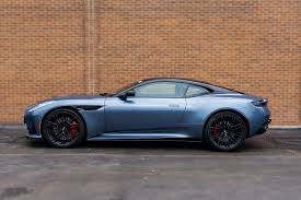 Image result for Concours Blue 2025 Aston Martin
