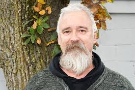 Volunteer trainer reaches 2000 games