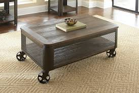 Round coffee table with caster wheels and wood textured surface for living room (distressed brown) 5.0 out of 5 stars 1. Barrow Lift Top Cocktail Table W Casters Cleo S Furniture
