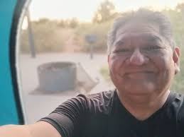 Sleeping in car with attachable tent